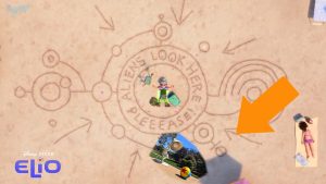 Elio draws the Pixar Emeryville campus layout in the sand