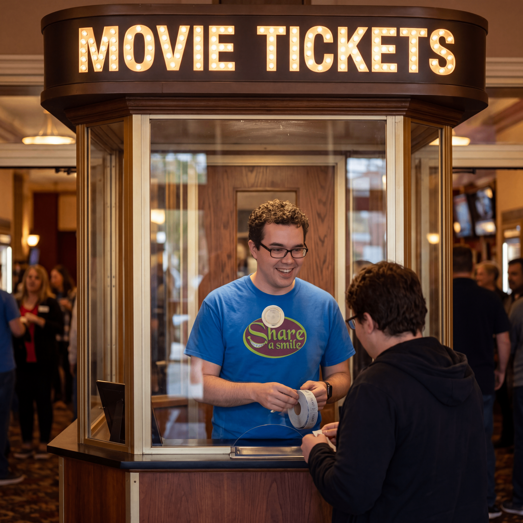 Crazy Nate in a movie ticket booth